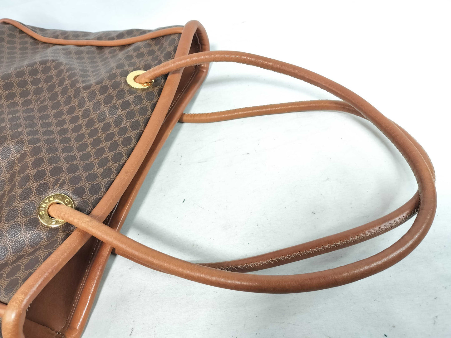 CELINE Macadam Brown Tote Bag with Gold Hardware and PVC and Leather.