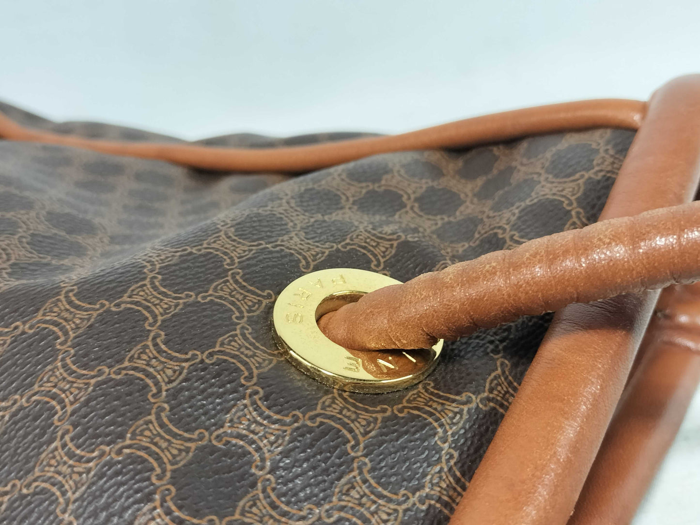 CELINE Macadam Brown Tote Bag with Gold Hardware and PVC and Leather.