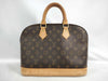 LOUIS VUITTON Monogram Alma Handbag