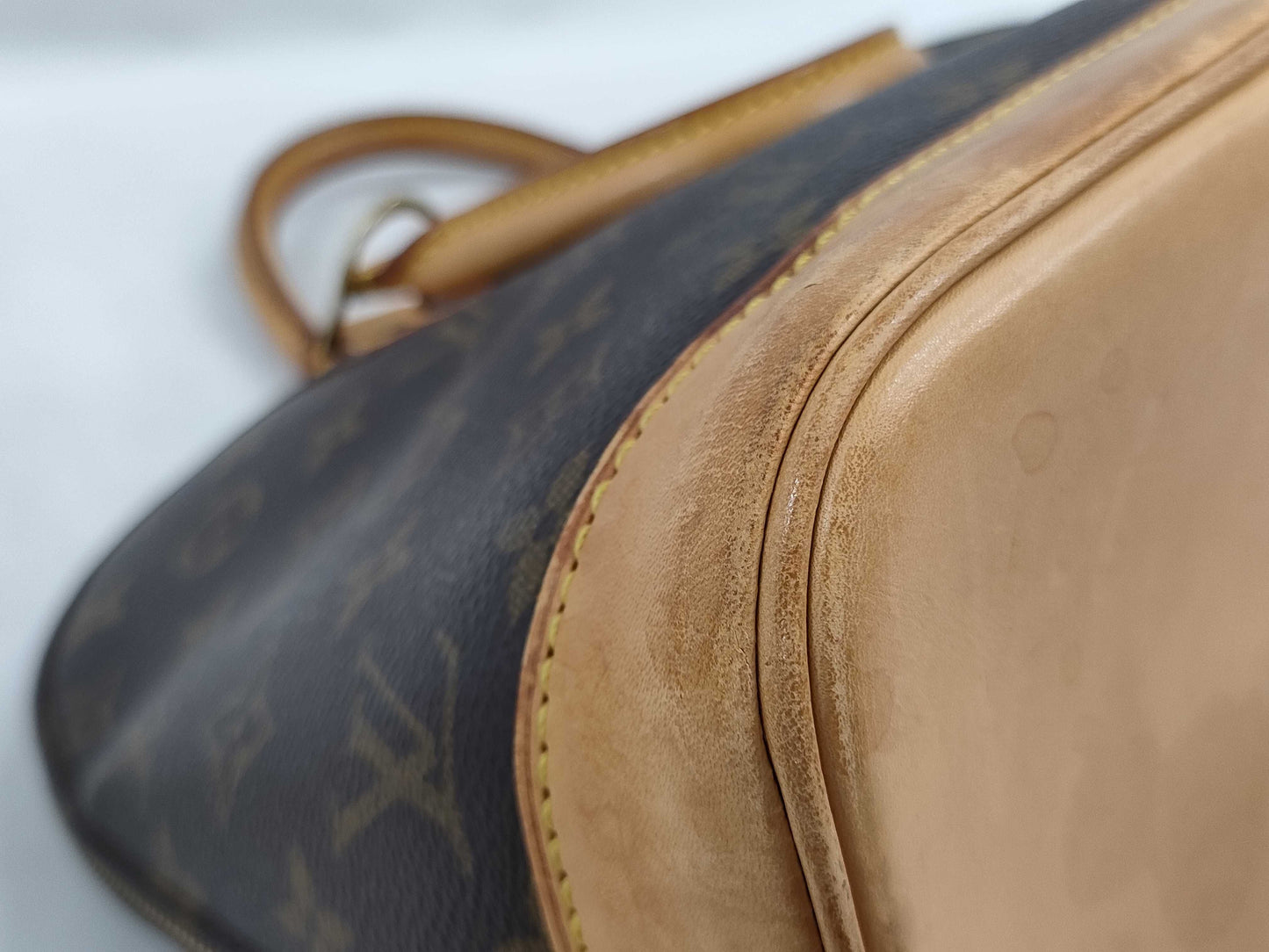 LOUIS VUITTON Monogram Alma Handbag