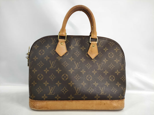 LOUIS VUITTON Monogram Alma Handbag