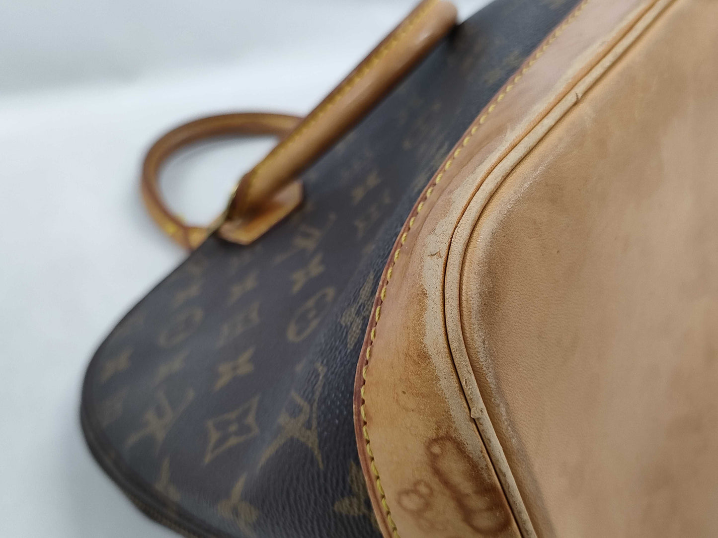 LOUIS VUITTON Monogram Alma Handbag