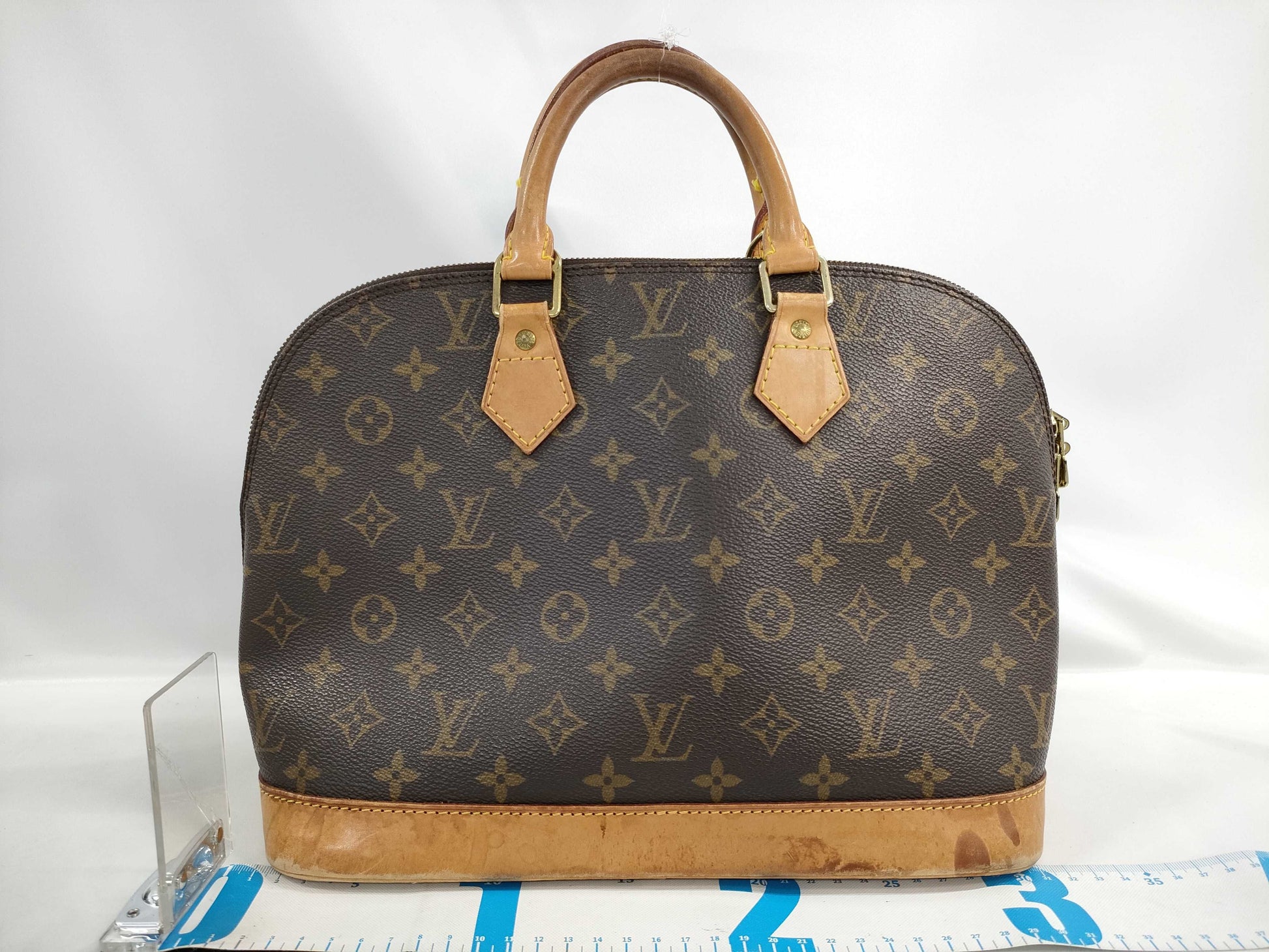 LOUIS VUITTON Monogram Alma Handbag