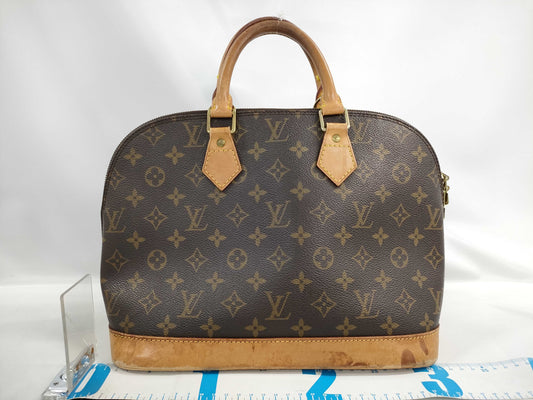 LOUIS VUITTON Monogram Alma Handbag
