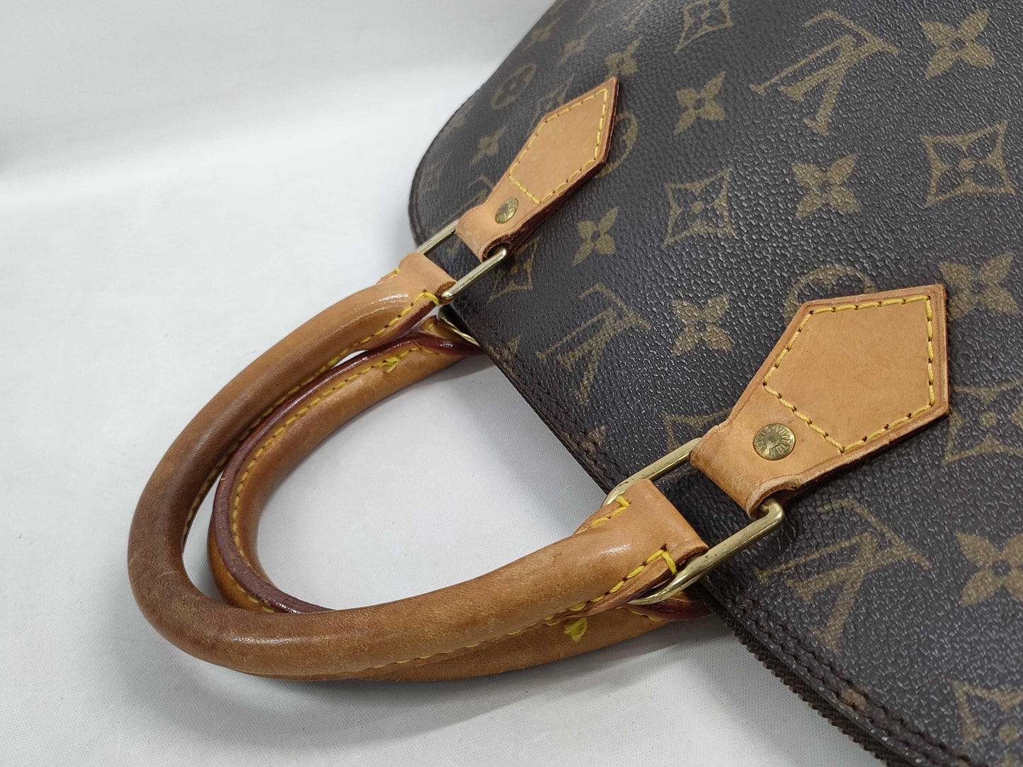 LOUIS VUITTON Monogram Alma Handbag
