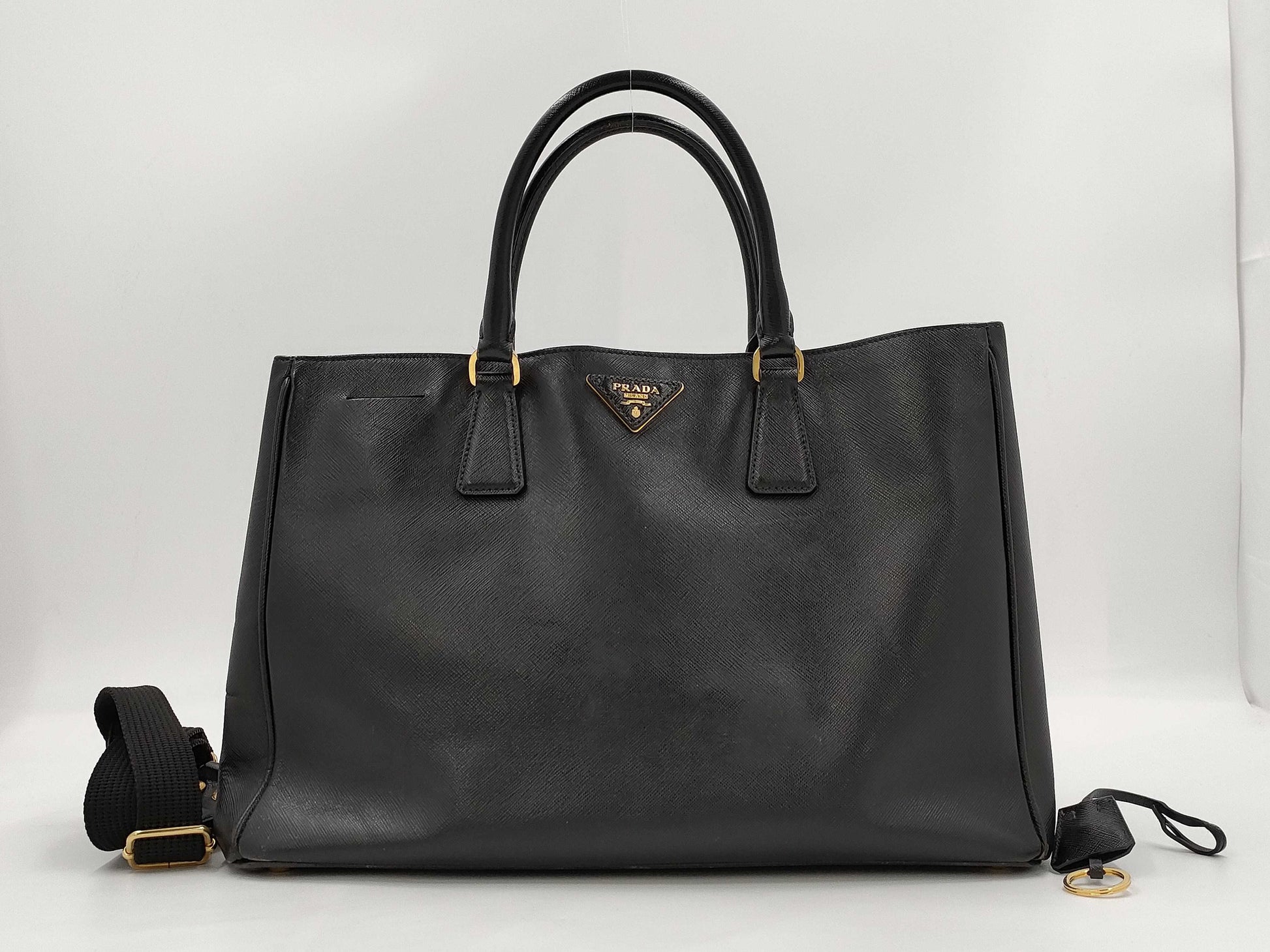 PRADA Saffiano Galleria 2-Way Handbag in Black with GD Hardware and Shoulder Strap with Clochet