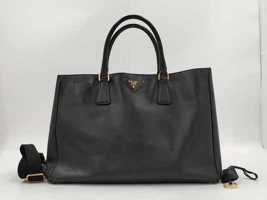 PRADA Saffiano Galleria 2-Way Handbag in Black with GD Hardware and Shoulder Strap with Clochet