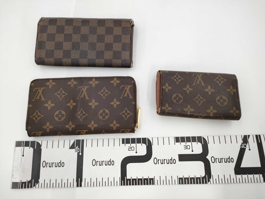 LOUIS VUITTON Monogram 3-Piece Wallet Set: Zippy Wallet, Damier Wallet, Portefeuille Sarah Wallet, and Porte Monne Zip Wallet