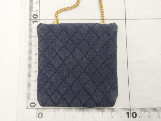 CHANEL Mini Matelasse Jersey Pouch in Navy with Gold Hardware