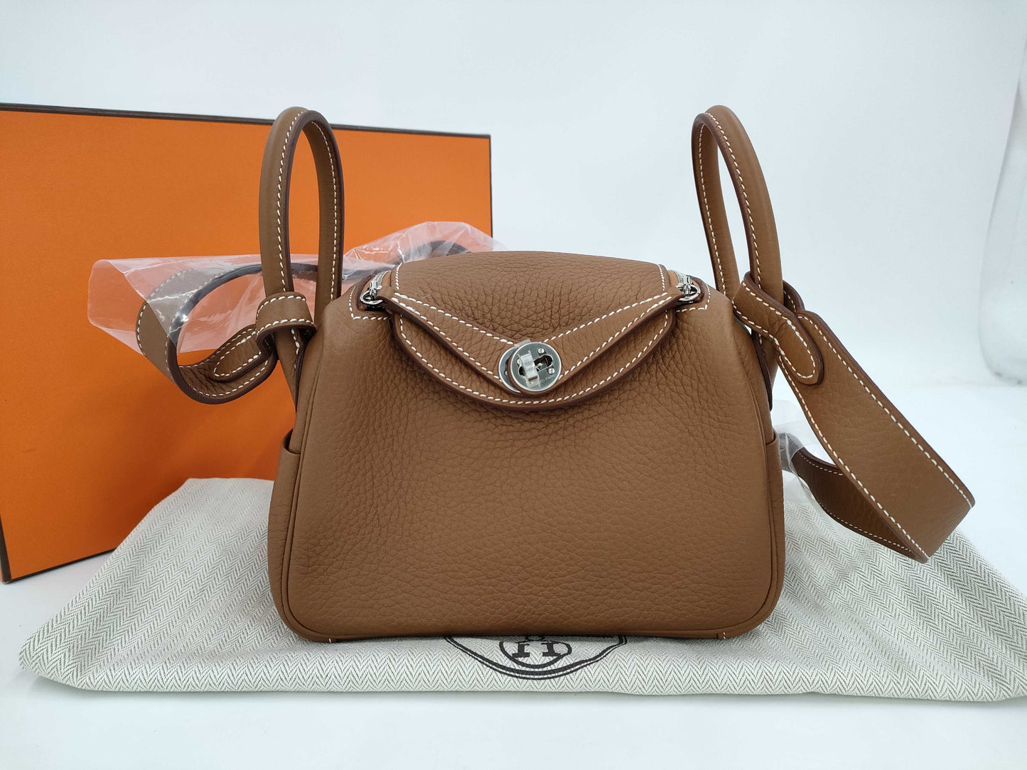 HERMES Lindy Mini Shoulder Bag in Taurillon Gold with Silver Hardware and K Stamp, with Protective Seal