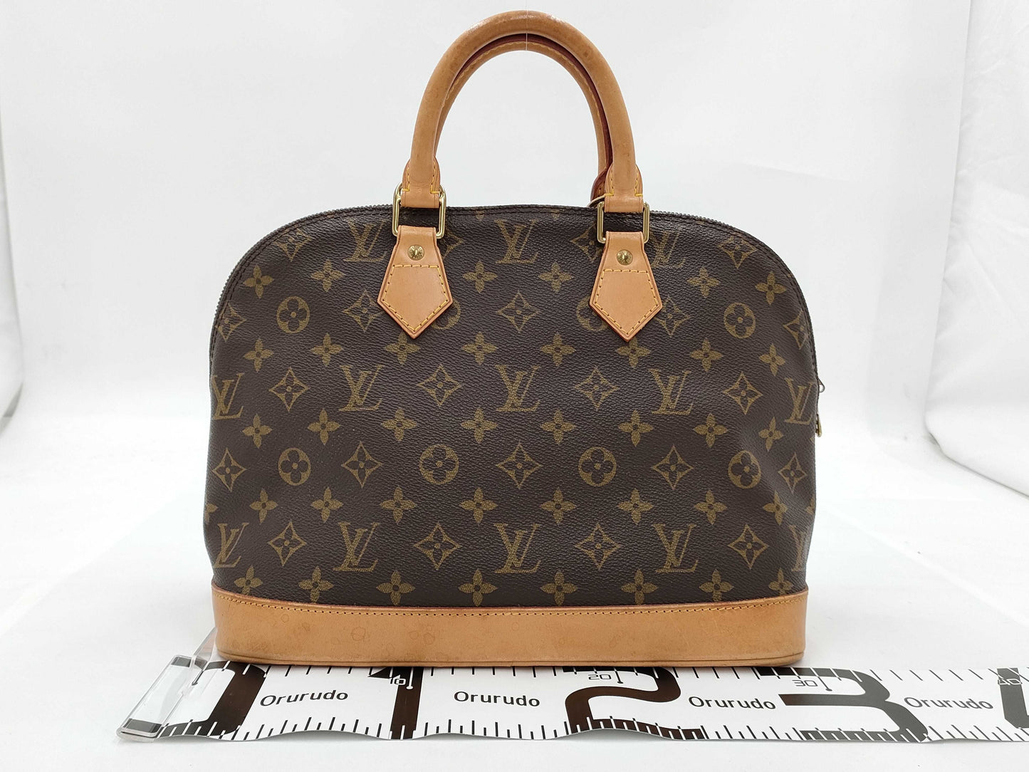 LOUIS VUITTON Monogram Alma Handbag