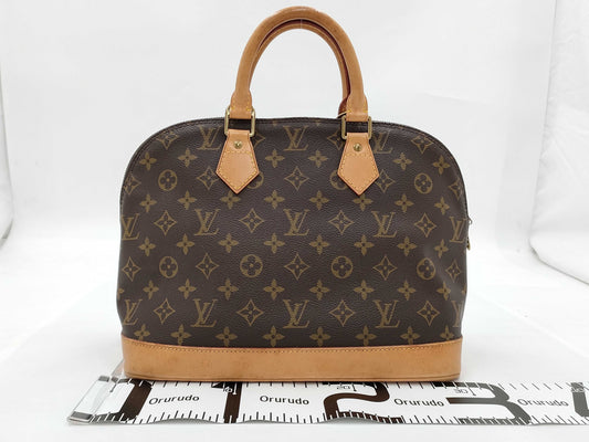 LOUIS VUITTON Monogram Alma Handbag