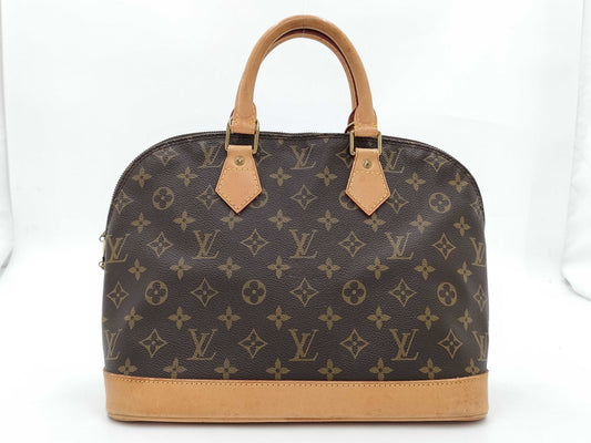 LOUIS VUITTON Monogram Alma Handbag