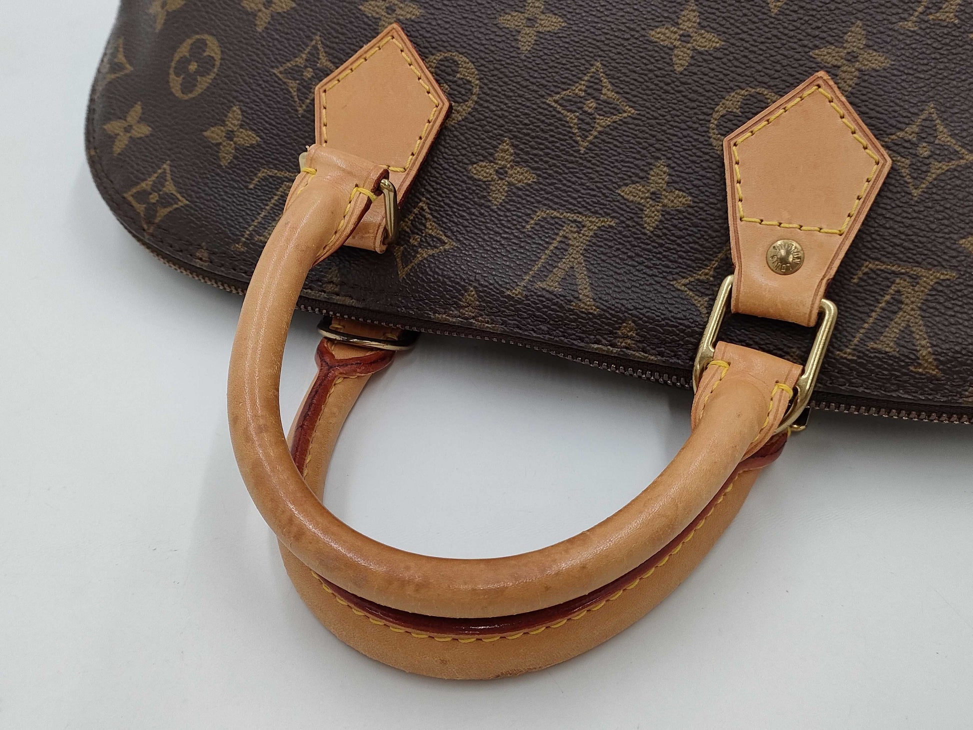 LOUIS VUITTON Monogram Alma Handbag