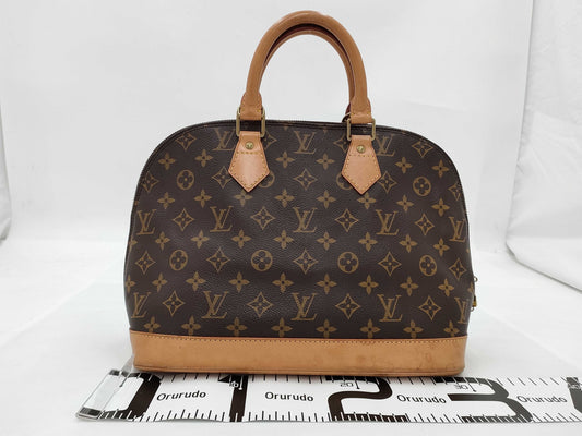 LOUIS VUITTON Monogram Alma Handbag