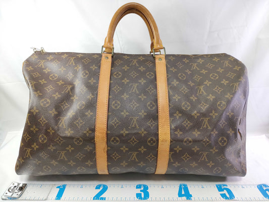 LOUIS VUITTON Monogram Vuitton Keypol 55 Boston Bag