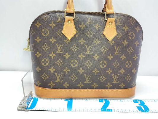 LOUIS VUITTON Monogram LOUIS VUITTON ALMA AR1909 Handbag with PM Strap
