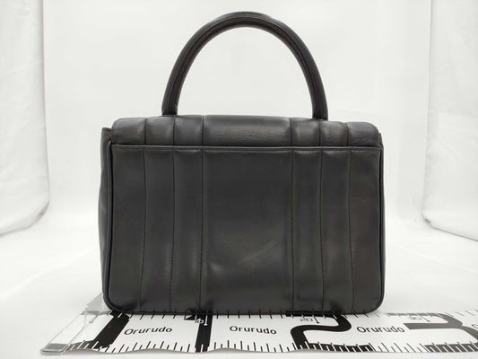 CHANEL Mademoiselle Handbag Black Turnlock Handbag