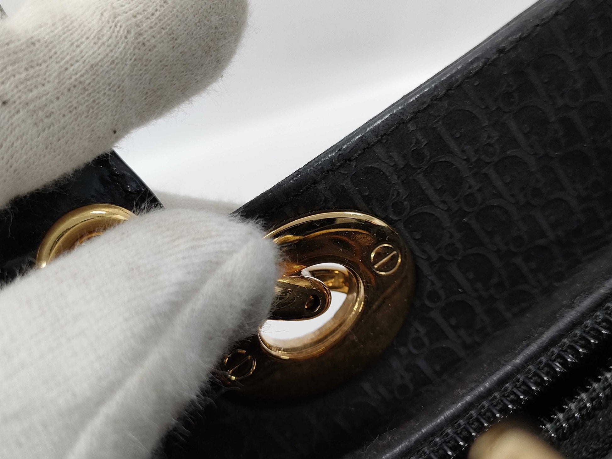 Dior Lady Dior Suede Black Handbag with dust bag and shoulder strap.