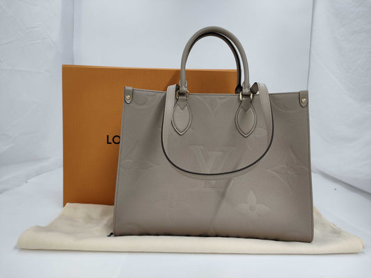 LOUIS VUITTON On the Go MM Monogram Empreinte Tourterelle M45607 Tote Bag