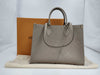 LOUIS VUITTON On the Go MM Monogram Empreinte Tourterelle M45607 Tote Bag