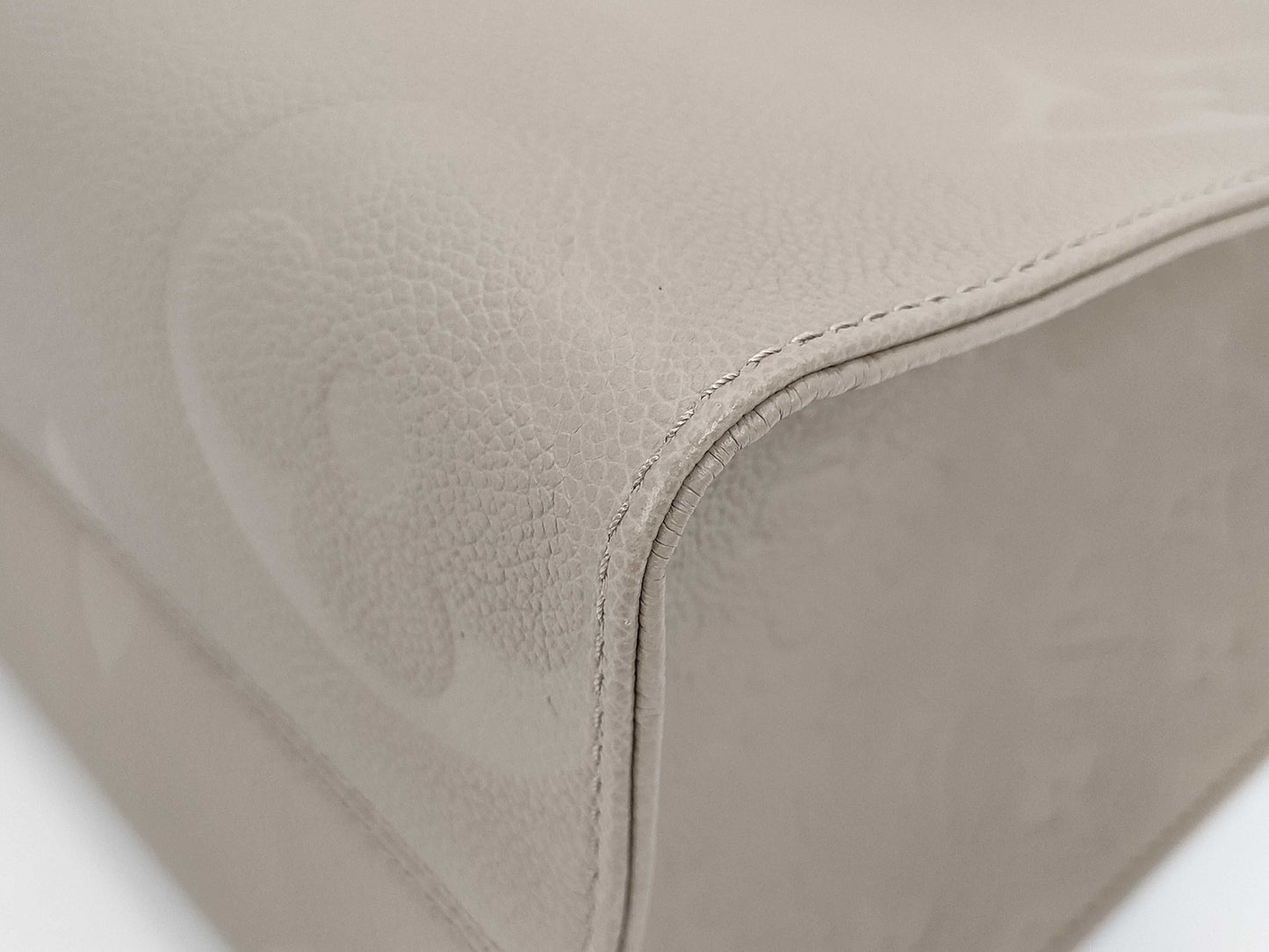 LOUIS VUITTON On the Go MM Monogram Empreinte Tourterelle M45607 Tote Bag