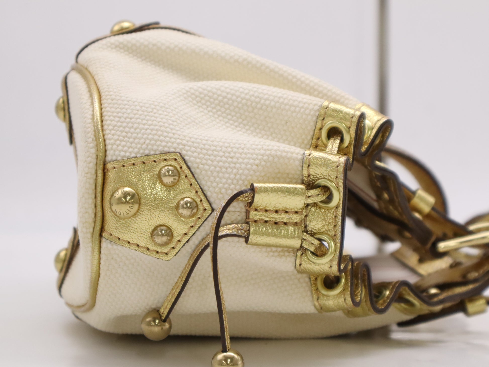 LOUIS VUITTON M92391 Canvas and Leather Teda GM Gold and Ivory Handbag