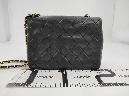 CHANEL Mini Matlasser Black No. 1 Shoulder Bag