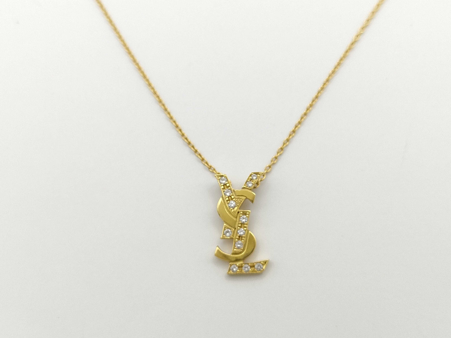 Yves Saint Laurent Logo D0.11ct K18 3.4g Necklace in Precious Metal