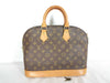 LOUIS VUITTON Monogram Alma Handbag