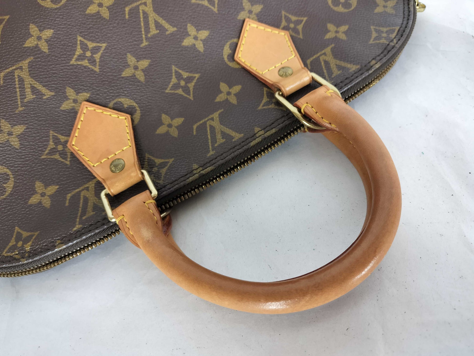 LOUIS VUITTON Monogram Alma Handbag