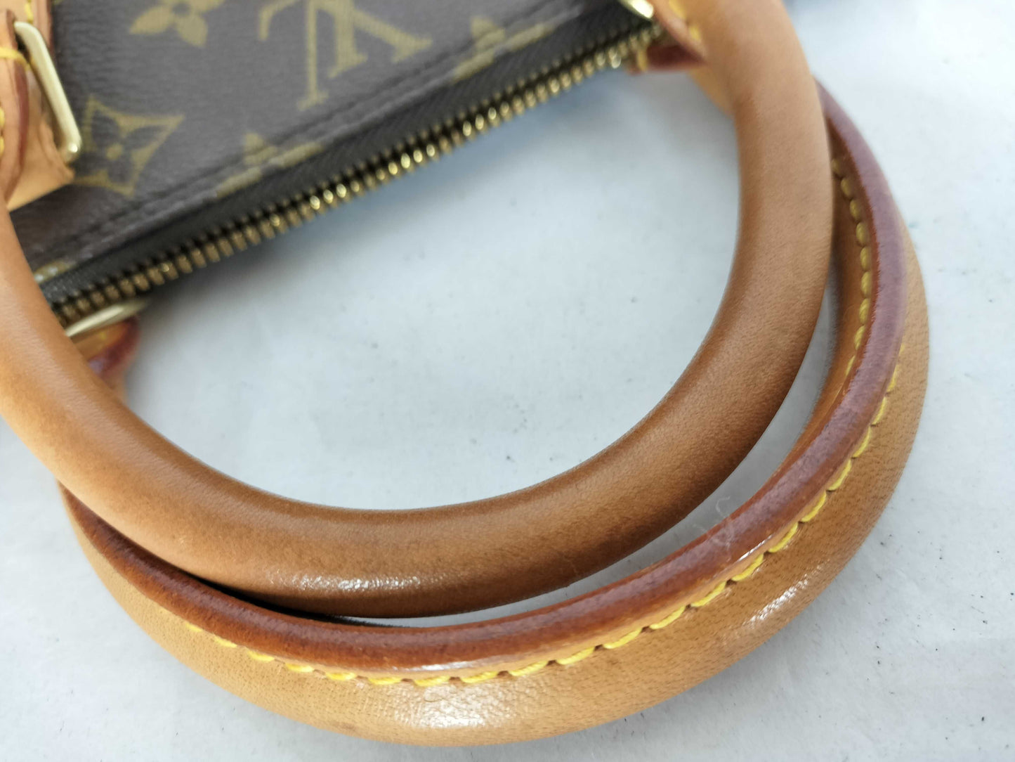 LOUIS VUITTON Monogram Alma Handbag
