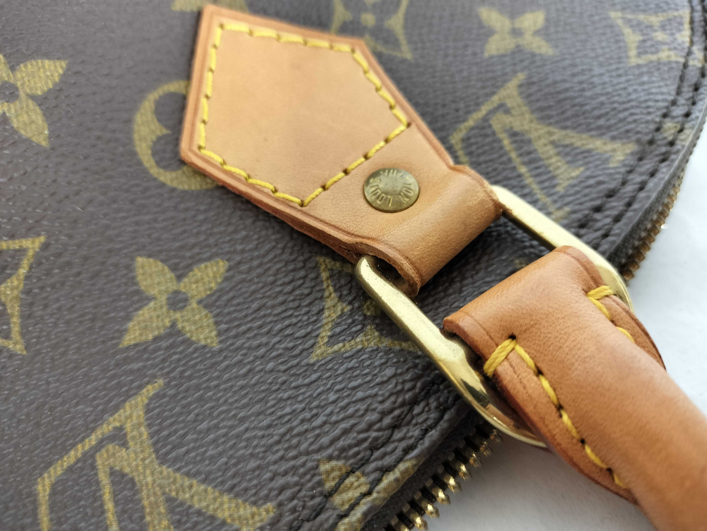 LOUIS VUITTON Monogram Alma Handbag