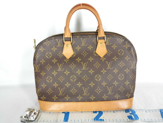 LOUIS VUITTON Monogram Alma Handbag