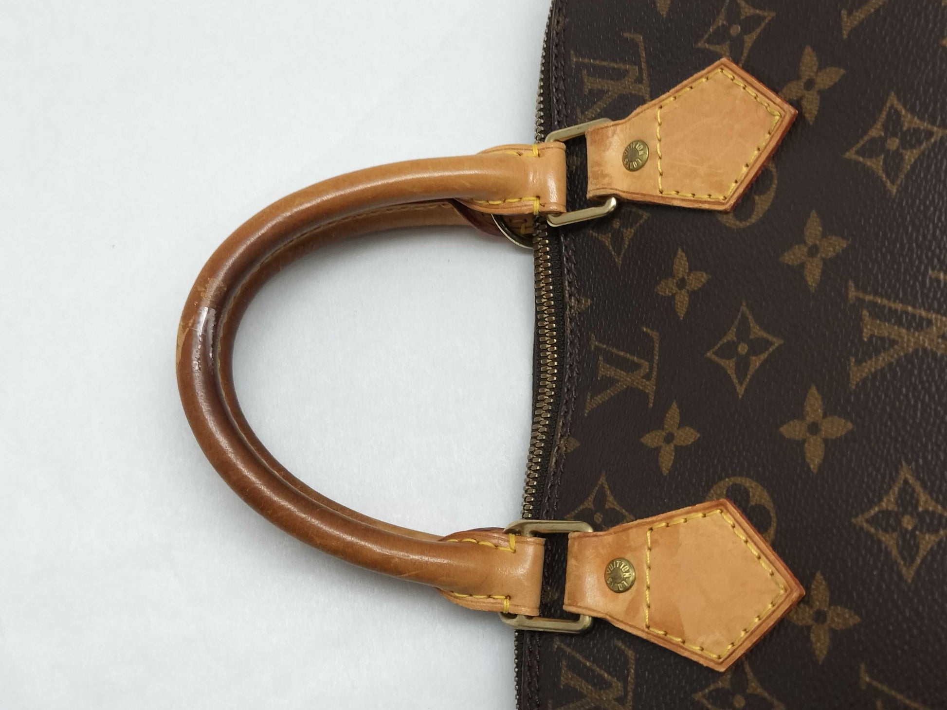 LOUIS VUITTON Monogram Alma Handbag