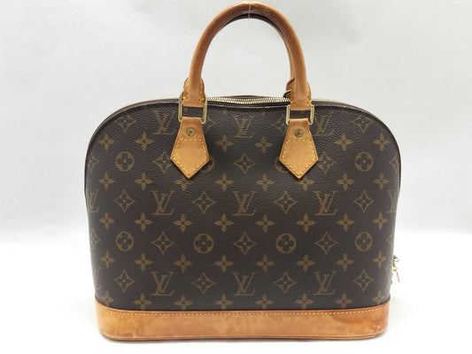 LOUIS VUITTON Monogram Alma Handbag