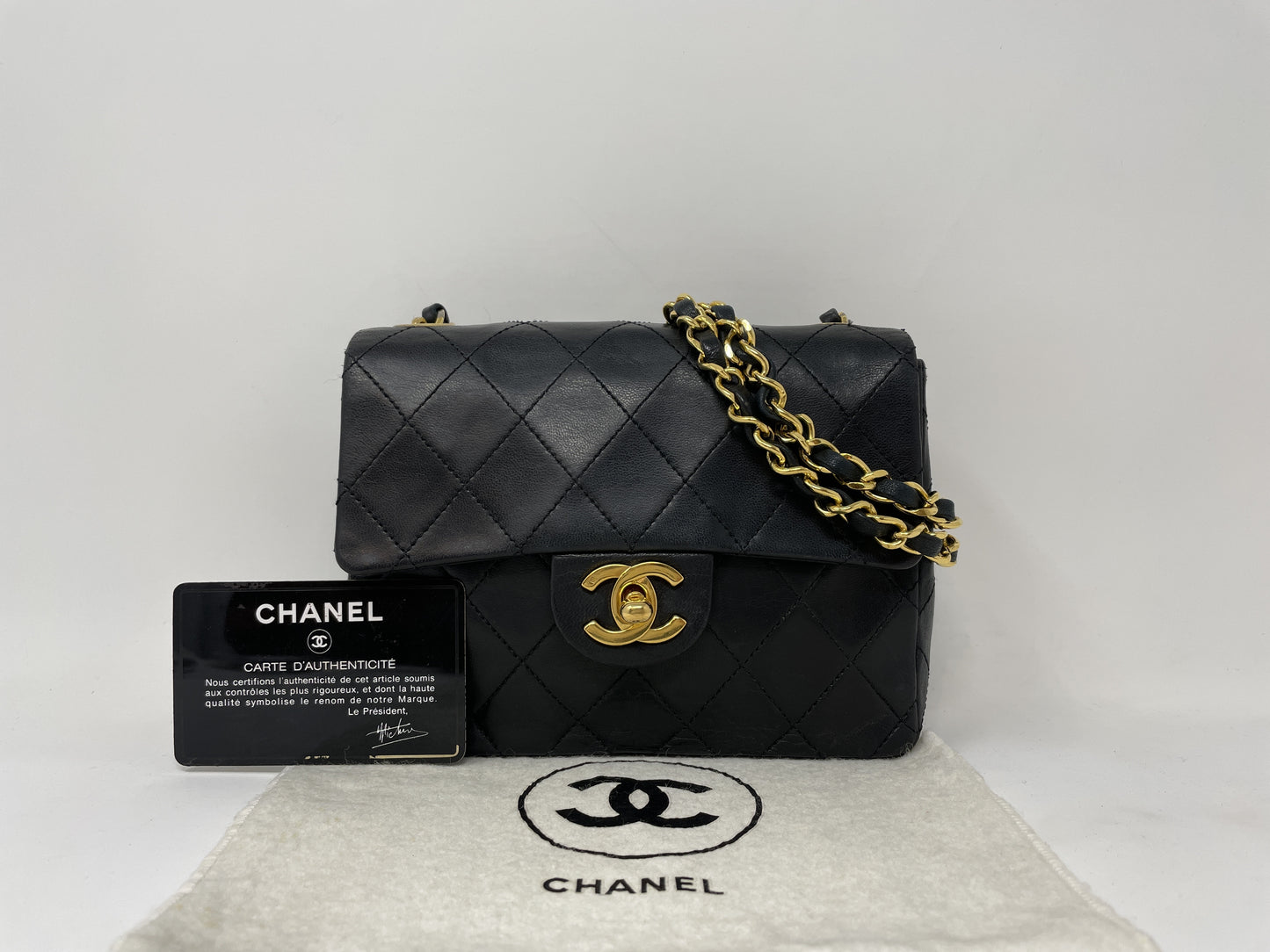 CHANEL CHANEL Mini Matelasse Shoulder Bag with Gold Hardware, Coco Mark, and Turn Lock