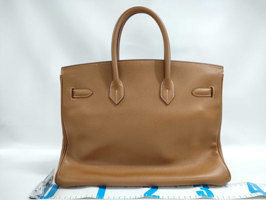 HERMES Birkin 35 Gold with Sterling Silver Hardware, D Stamped Handbag
