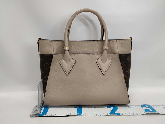 LOUIS VUITTON Louis Vuitton On My Side Handbag Handbag