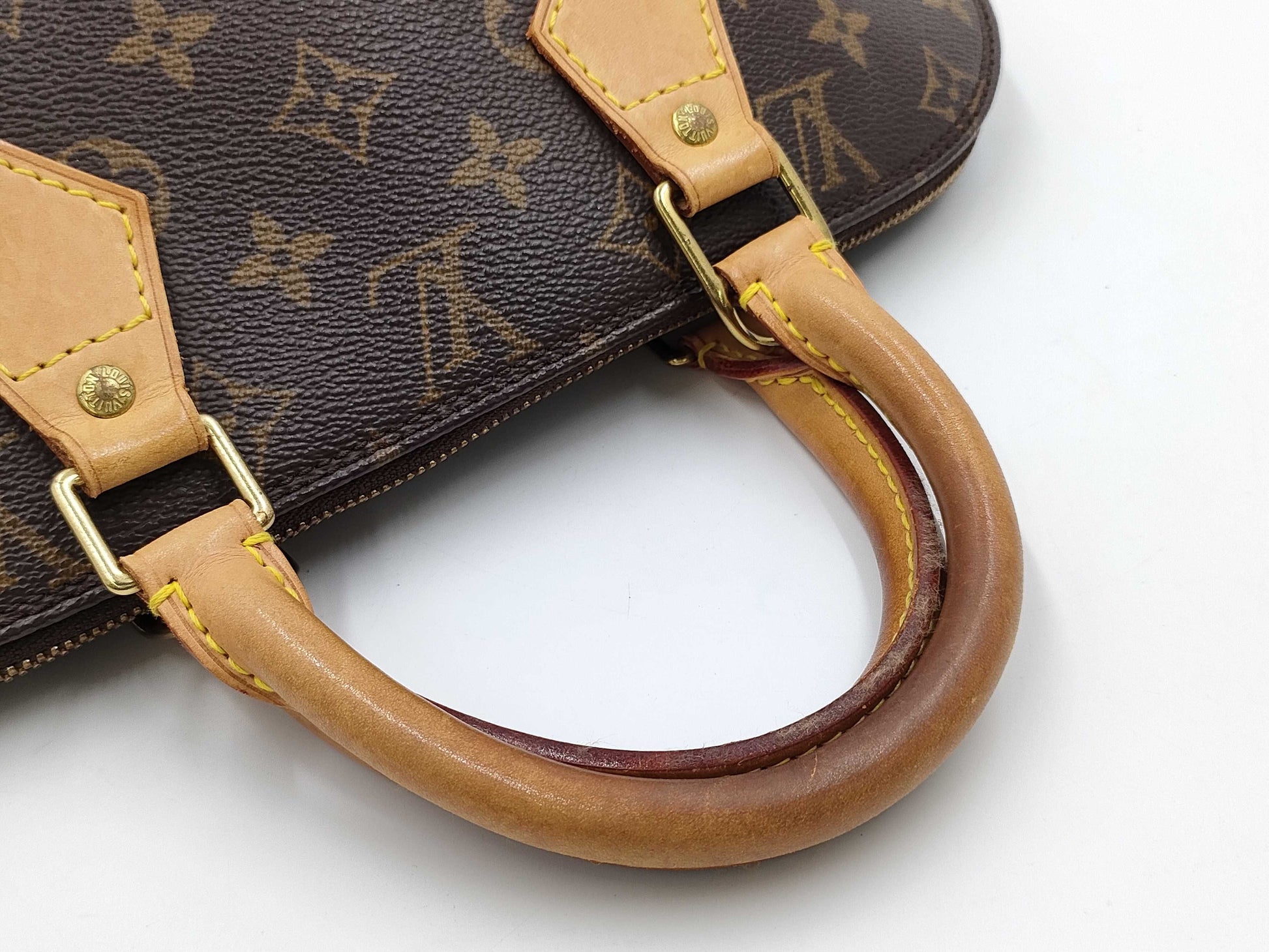 LOUIS VUITTON Monogram ALMA Handbag
