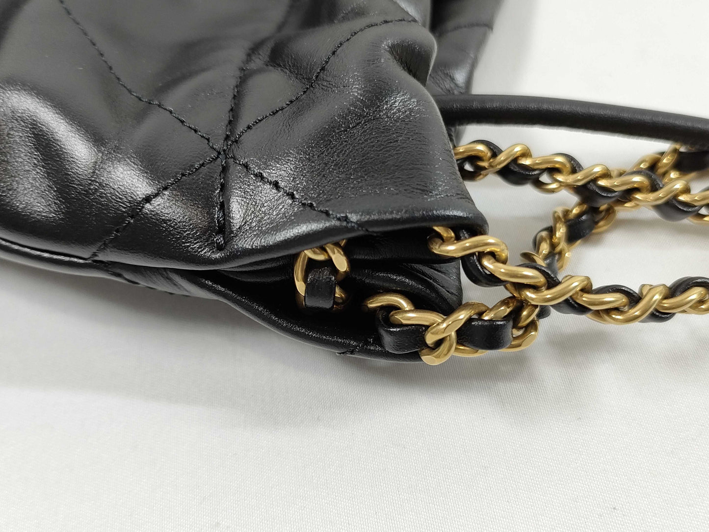 CHANEL CHANEL 22 Shiny Calfskin Chain Shoulder Bag with Gold Hardware and Serial Number Plate in Black