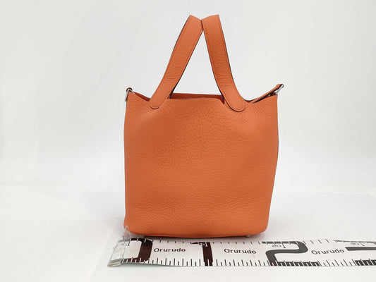 HERMES Picotin Lock PM Handbag, Orange Minian, Taurillon Clemence Leather, W Stamped, Handbag