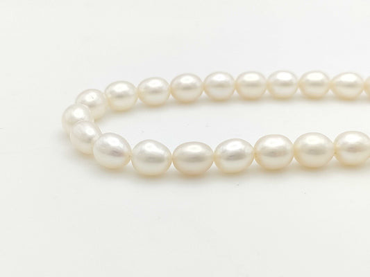 Semi-round pearl, diameter approximately 7.0-7.4mm, 18K white gold, 33.3g, necklace