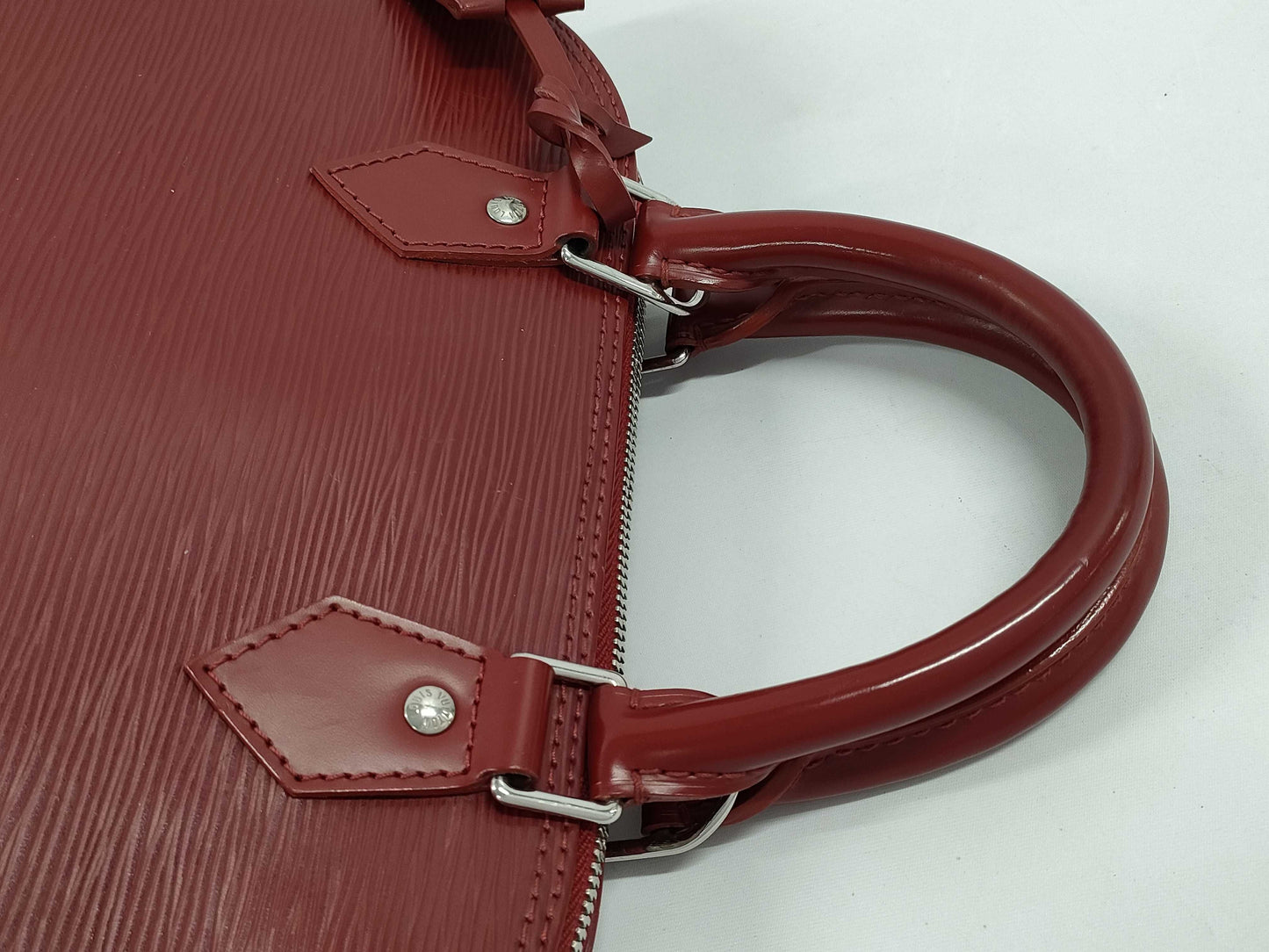LOUIS VUITTON Epi Alma Handbag