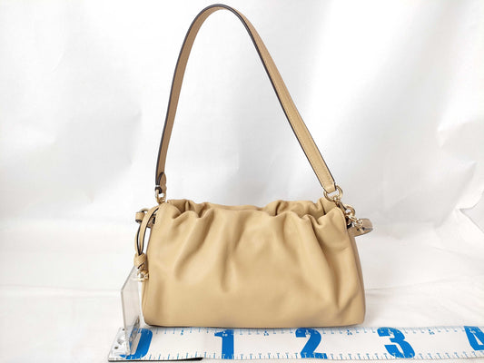 COACH Faye Drawstring Shoulder Bag in Beige Leather