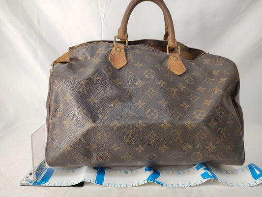 LOUIS VUITTON Monogram Louis Vuitton Monogram Speedy 30 Handbag