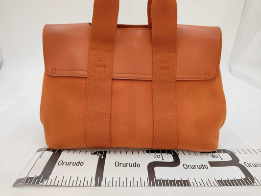 HERMES Toile Chevron/Leather Valparaiso PM. Accessories: Pouch and Tote Bag.