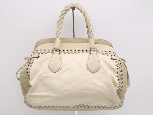 PRADA Nylon/Leather Triangle Logo Handbag in Beige and White with Silver Hardware