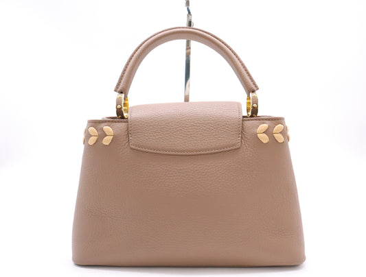 LOUIS VUITTON M54882 Taurillon Leather Capucines PM Handbag in Pink Beige with Stitching, RFID Verified