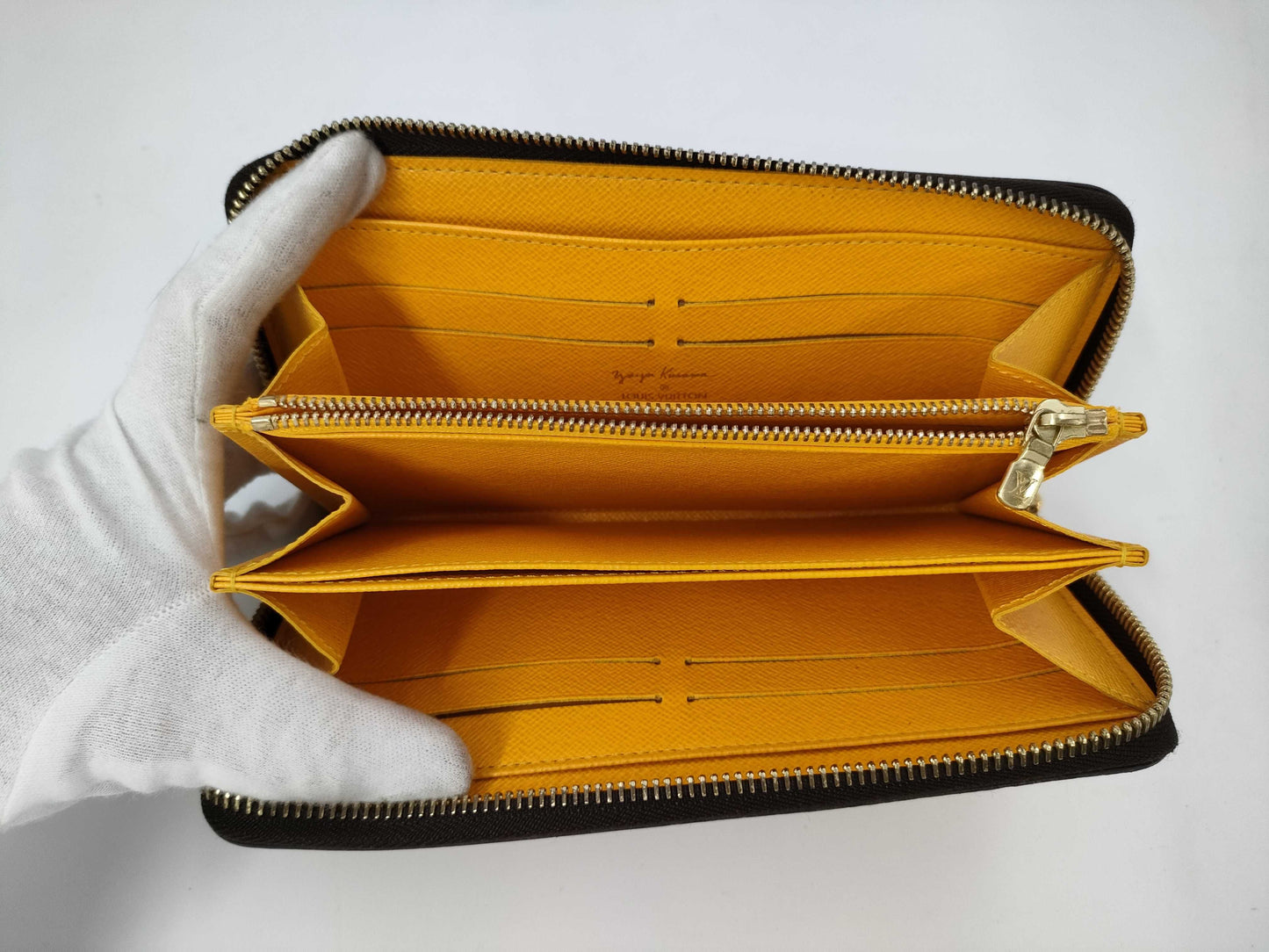 LOUIS VUITTON Pumpkin Dot Zippy Wallet
